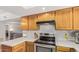 Modern kitchen featuring stainless steel appliances, updated countertops and good lighting at 700 E Mesquite Cir # N125, Tempe, AZ 85288