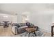 Inviting living room featuring a sofa, a stylish table and modern decor at 700 E Mesquite Cir # N125, Tempe, AZ 85288