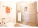Bright bathroom featuring a tiled shower, toilet and vanity, designed for comfort and style at 7009 E Acoma Dr # 1160, Scottsdale, AZ 85254