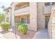 Inviting condo exterior with balconies, lush landscaping, and private entrance at 7009 E Acoma Dr # 1160, Scottsdale, AZ 85254