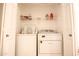 Convenient laundry room featuring side-by-side washer and dryer setup for easy chore management at 7009 E Acoma Dr # 1160, Scottsdale, AZ 85254