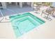 Inviting hot tub surrounded by comfortable lounge seating at the community pool area at 7009 E Acoma Dr # 1160, Scottsdale, AZ 85254
