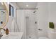 Bathroom featuring white-tiled shower with a shower curtain and bronze fixtures at 736 N Meadows Dr, Chandler, AZ 85224