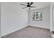 Bedroom with a ceiling fan, window that lets in natural lighting, and carpeted floor at 736 N Meadows Dr, Chandler, AZ 85224