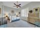 Bright bedroom features a large shuttered window, elegant metal bed frame, and a classic wooden dresser, creating a serene atmosphere at 7500 E Pontebella Dr, Scottsdale, AZ 85266