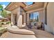 Inviting front porch featuring seating area with columns at 7500 E Pontebella Dr, Scottsdale, AZ 85266