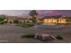 Expansive backyard featuring gravel landscaping, grassy areas, and mature trees for relaxing outdoor living at 8220 W Mariposa Grande Ln, Peoria, AZ 85383