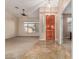 Welcoming foyer featuring tile flooring and a solid wood front door at 8220 W Mariposa Grande Ln, Peoria, AZ 85383