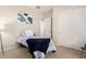 Cozy bedroom featuring a comfortable single bed and a modern, minimalist aesthetic at 9747 S 182Nd Dr, Goodyear, AZ 85338