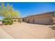 Attractive single-Gathering home with a large driveway and well-maintained desert landscaping at 9747 S 182Nd Dr, Goodyear, AZ 85338