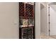 Custom wine storage unit provides space for storing and chilling wine at 9747 S 182Nd Dr, Goodyear, AZ 85338