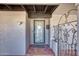 Front door with security screen and porch with brick flooring at 11035 N 37Th St, Phoenix, AZ 85028