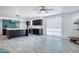 Open-concept kitchen and living area with modern fixtures and tile flooring throughout the area at 11035 N 37Th St, Phoenix, AZ 85028