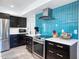Close-up view of the updated kitchen showcasing modern appliances and sleek design at 11035 N 37Th St, Phoenix, AZ 85028
