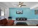 Bright living room with modern tile flooring and large windows, filled with natural light at 11035 N 37Th St, Phoenix, AZ 85028