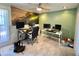 Spacious home office with tile floors, natural light, and multiple monitors and desks at 11035 N 37Th St, Phoenix, AZ 85028