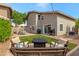 Outdoor oasis features a patio, seating and grill area for entertaining guests at 1138 E Liberty Shores Dr, Gilbert, AZ 85234