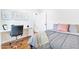 Comfortable bedroom with a cozy bed, modern desk area, and minimalist art at 1138 E Liberty Shores Dr, Gilbert, AZ 85234