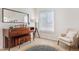 Music room with a piano, lamp and chair at 1138 E Liberty Shores Dr, Gilbert, AZ 85234