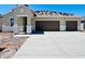 Charming single-story home featuring a two-car garage and a spacious driveway on a clear, sunny day at 12485 E Bahia Ct, Florence, AZ 85132