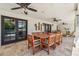 View of patio with table and chairs looking toward the pool and backyard at 14401 N Coral Gables Dr, Phoenix, AZ 85023
