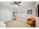 bedroom with a ceiling fan, carpet, and playful decor at 1748 E Cortez Dr, Gilbert, AZ 85234