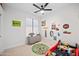 bedroom features playful decor, carpet, and a dresser at 1748 E Cortez Dr, Gilbert, AZ 85234