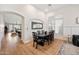 Dining room with table, chairs and access to the living room and kitchen at 1748 E Cortez Dr, Gilbert, AZ 85234