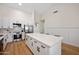 Bright open kitchen featuring a large island and stainless steel appliances at 1748 E Cortez Dr, Gilbert, AZ 85234