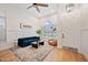 Bright living room featuring large windows, couch, and chairs at 1748 E Cortez Dr, Gilbert, AZ 85234