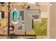 Aerial view showcasing the backyard pool, solar panels, and low-maintenance desert landscaping at 18642 N 13Th Ave, Phoenix, AZ 85027