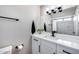 Modern bathroom featuring sleek fixtures, a marble vanity, and a minimalist design for a clean and contemporary feel at 18642 N 13Th Ave, Phoenix, AZ 85027