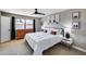 Bright bedroom with a ceiling fan, natural light from the window, and classic design at 18642 N 13Th Ave, Phoenix, AZ 85027