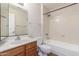 Full bathroom features a single sink vanity and a shower over tub at 221 N Ironwood St, Gilbert, AZ 85234