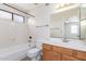 Clean bathroom featuring a single sink vanity and shower over tub at 221 N Ironwood St, Gilbert, AZ 85234