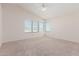 Spacious bedroom with vaulted ceiling and large windows providing natural light at 221 N Ironwood St, Gilbert, AZ 85234