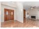 Inviting foyer featuring wood floors, a fireplace, and views of adjacent rooms at 221 N Ironwood St, Gilbert, AZ 85234