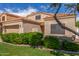 View of a one-story home with well-maintained lawn and neatly trimmed shrubbery at 221 N Ironwood St, Gilbert, AZ 85234