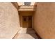 An eye-level view of a well-lit front porch and entryway at 221 N Ironwood St, Gilbert, AZ 85234