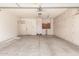 Spacious garage with built-in cabinets and ample storage space for vehicles and equipment at 221 N Ironwood St, Gilbert, AZ 85234