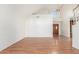 Open living room with wood floors, high ceilings, and a front door with lots of light at 221 N Ironwood St, Gilbert, AZ 85234