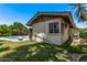 Landscaped backyard featuring a pool, patio furniture, and mature trees for shade and privacy at 425 E Del Rio Dr, Tempe, AZ 85282