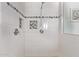 Shower with tiled walls, and mosaic accents, featuring sleek hardware at 425 E Del Rio Dr, Tempe, AZ 85282