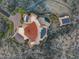 An aerial perspective highlighting the unique roof and solar panels of this desert home at 43105 N 102Nd St, Scottsdale, AZ 85262