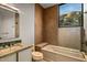 Bathroom features a tiled shower with a soaking tub and mountain views at 43105 N 102Nd St, Scottsdale, AZ 85262