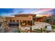 Desert home with modern architecture, large windows, private courtyard, and native landscaping at 43105 N 102Nd St, Scottsdale, AZ 85262