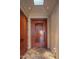 Elegant front entry door featuring decorative glass pane and modern design at 43105 N 102Nd St, Scottsdale, AZ 85262