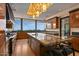 Modern kitchen with stainless steel appliances, a large island, and stunning mountain views at 43105 N 102Nd St, Scottsdale, AZ 85262