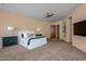 Expansive main bedroom offering ample space, plush carpet, and serene ambiance at 43105 N 102Nd St, Scottsdale, AZ 85262