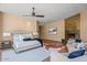 Spacious bedroom featuring fireplace, sitting area, and stylish decor for comfort and relaxation at 43105 N 102Nd St, Scottsdale, AZ 85262